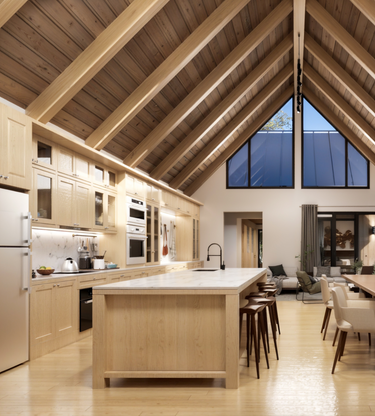A modern kitchen and dining area with a vaulted ceiling and exposed wooden beams. The kitchen features light wood cabinetry, a marble countertop island with bar stools, and built-in appliances. Large triangular windows bring in natural light, while the open layout connects seamlessly to a cozy living space adorned with curtains and stylish furniture.