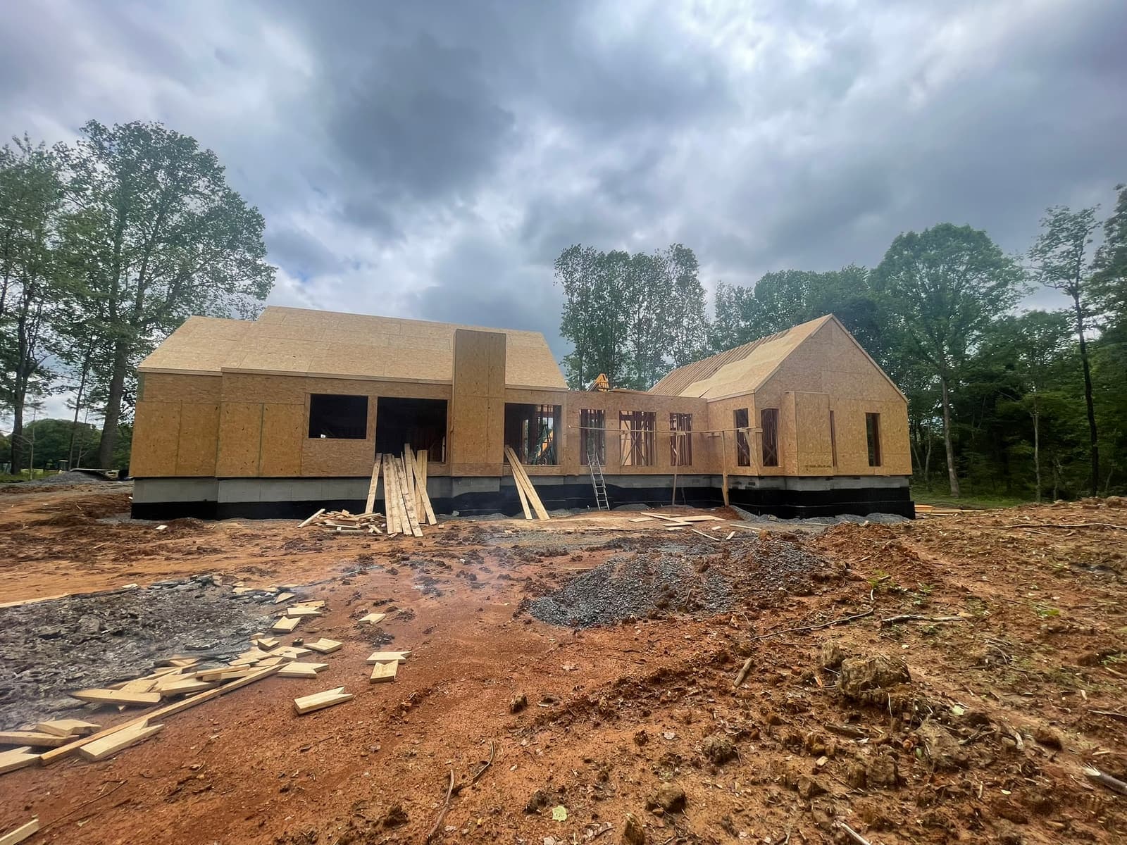 Framing on a foundation set into a cleared slope.