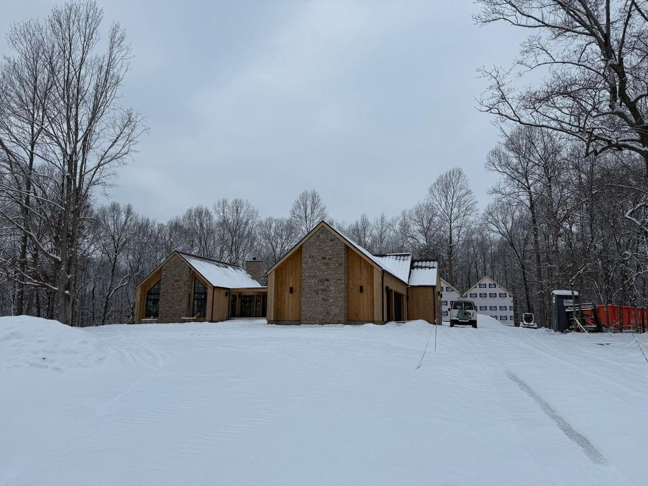 The house in snow, seen from the side.