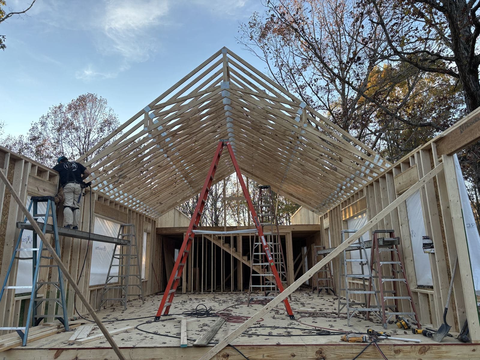 Inside the gable while the roof is still open rafters.