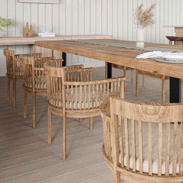 wood chairs, wood table and console in a dining rendering