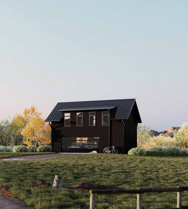 Modern house with a black exterior in a rural setting