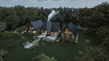 A modern A-frame cabin with a sloped black metal roof and wooden exterior set against a natural background of trees and grass. The structure includes large glass windows, a prominent chimney with smoke rising, and an adjacent garage. The scene is illuminated by soft daylight, emphasizing the clean lines and natural materials of the design