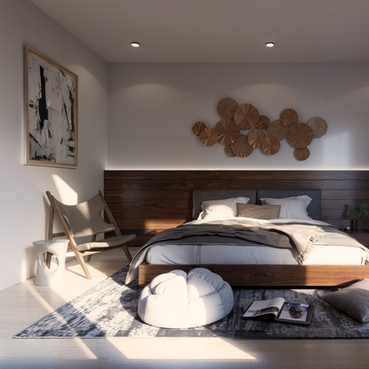 Modern bedroom design with a wooden accent wall and contemporary decor. Features a cozy bed with neutral linens, a sculptural chair, a textured pouf, and abstract wall art. Sunlight streams through, highlighting the minimalist and warm ambiance