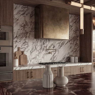 The Writer's Retreat, a modern mountain home in the Ozarks Lake, featuring a kitchen with a Calacata Viola marble backsplash and stainless steel Gaggenau appliances