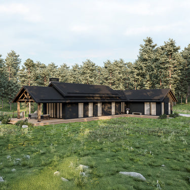 Wooden cabin in a forest setting with green grass and trees.